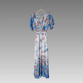 Vestido largo floral con escote trasero
