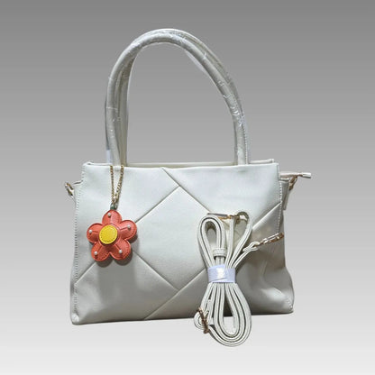 Borsa Effetto Rombo con Charm Fiore