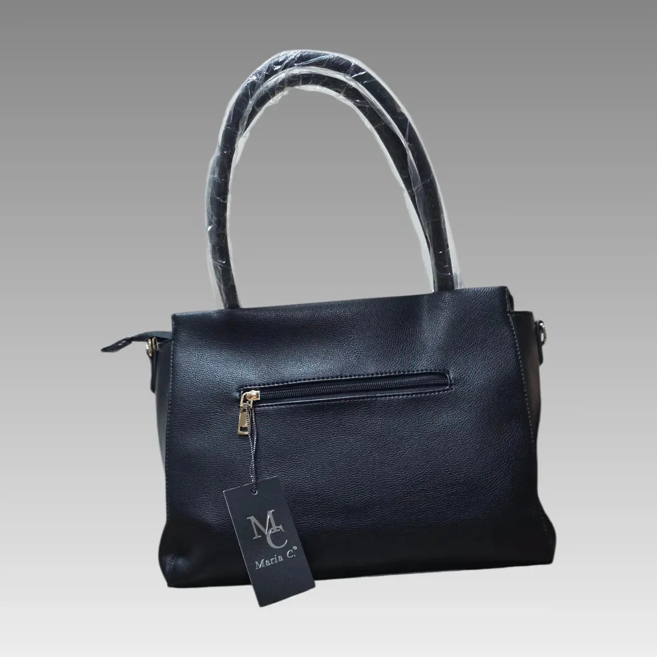Bolso efecto rombo con charm de flor