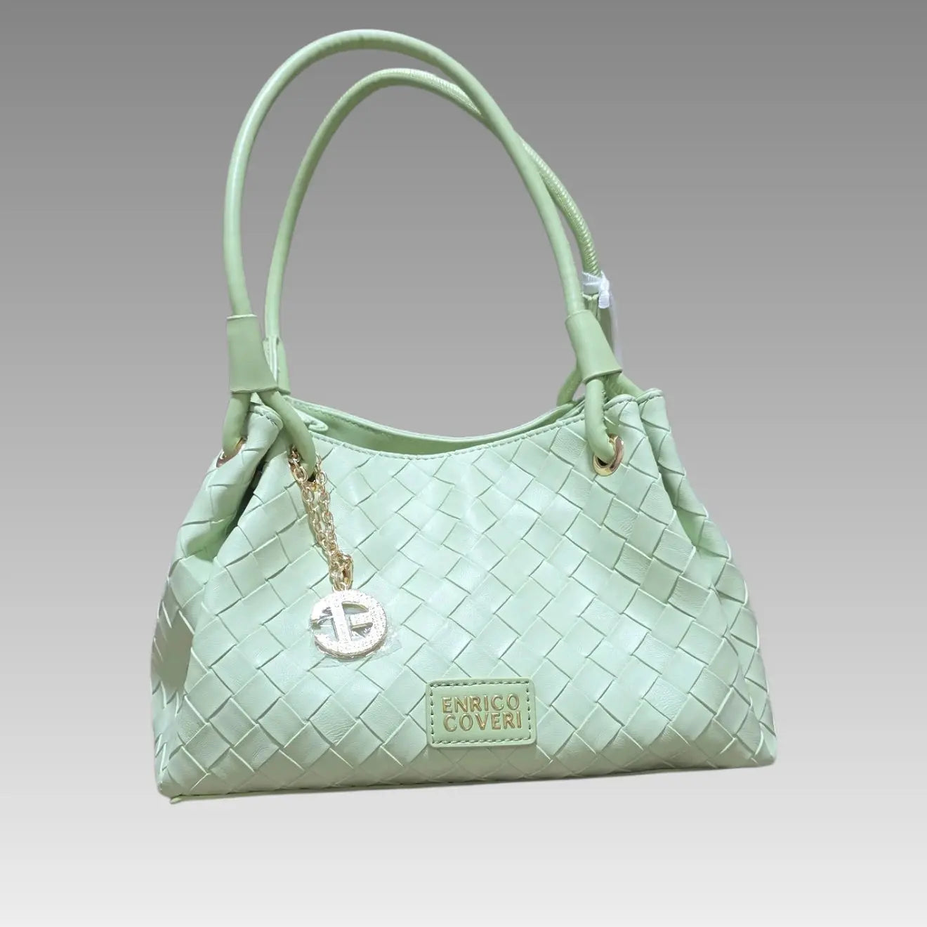 Bolso trenzado verde menta Enrico Coveri