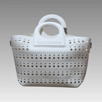 Bolso calado con pompón