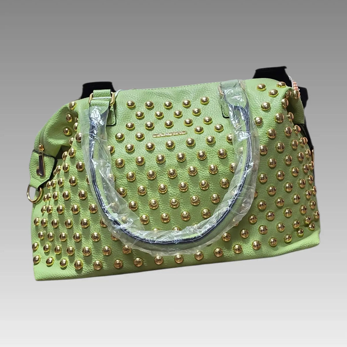 Maxi bolso tipo baúl con tachuelas Charro