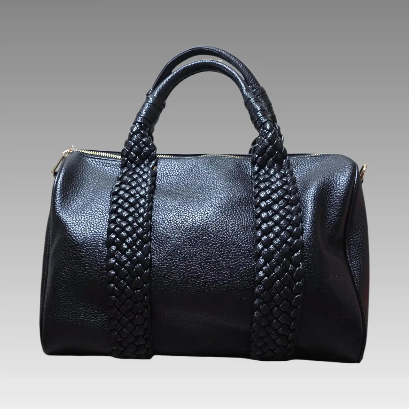 Maxi bolso tipo baúl trenzado negro
