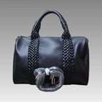 Maxi bolso tipo baúl trenzado negro