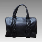 Maxi bolso tipo baúl trenzado negro