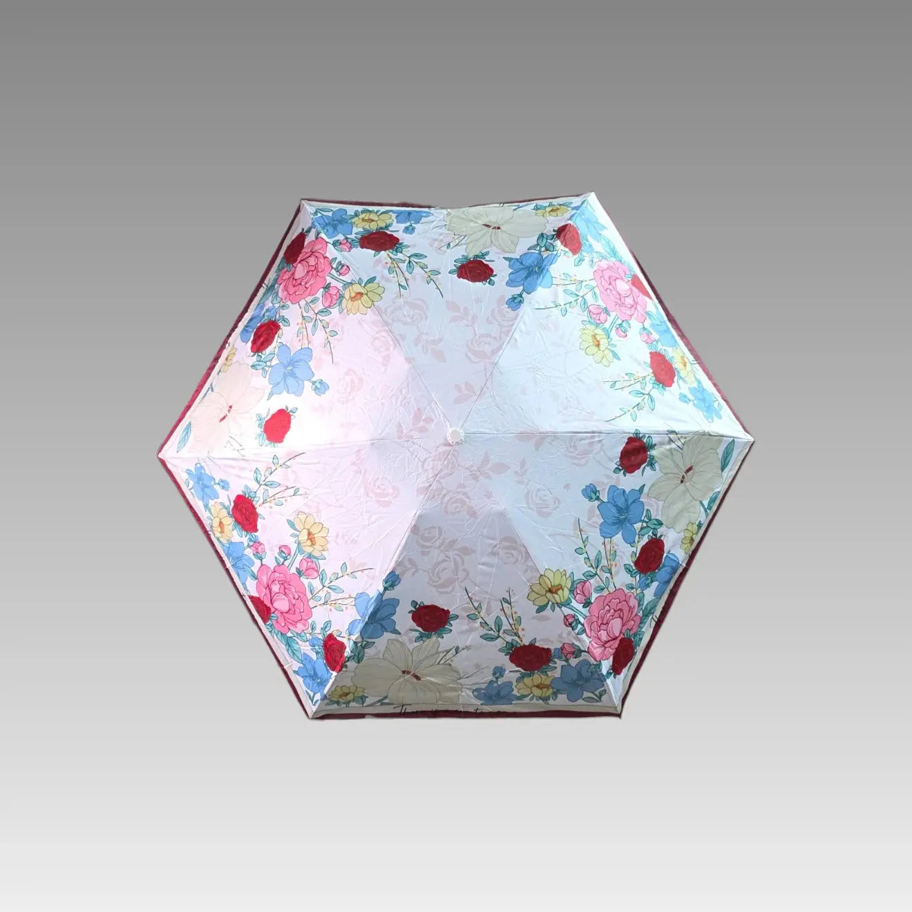Paraguas plegable floral