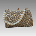 Clutch joya con strass y perlas