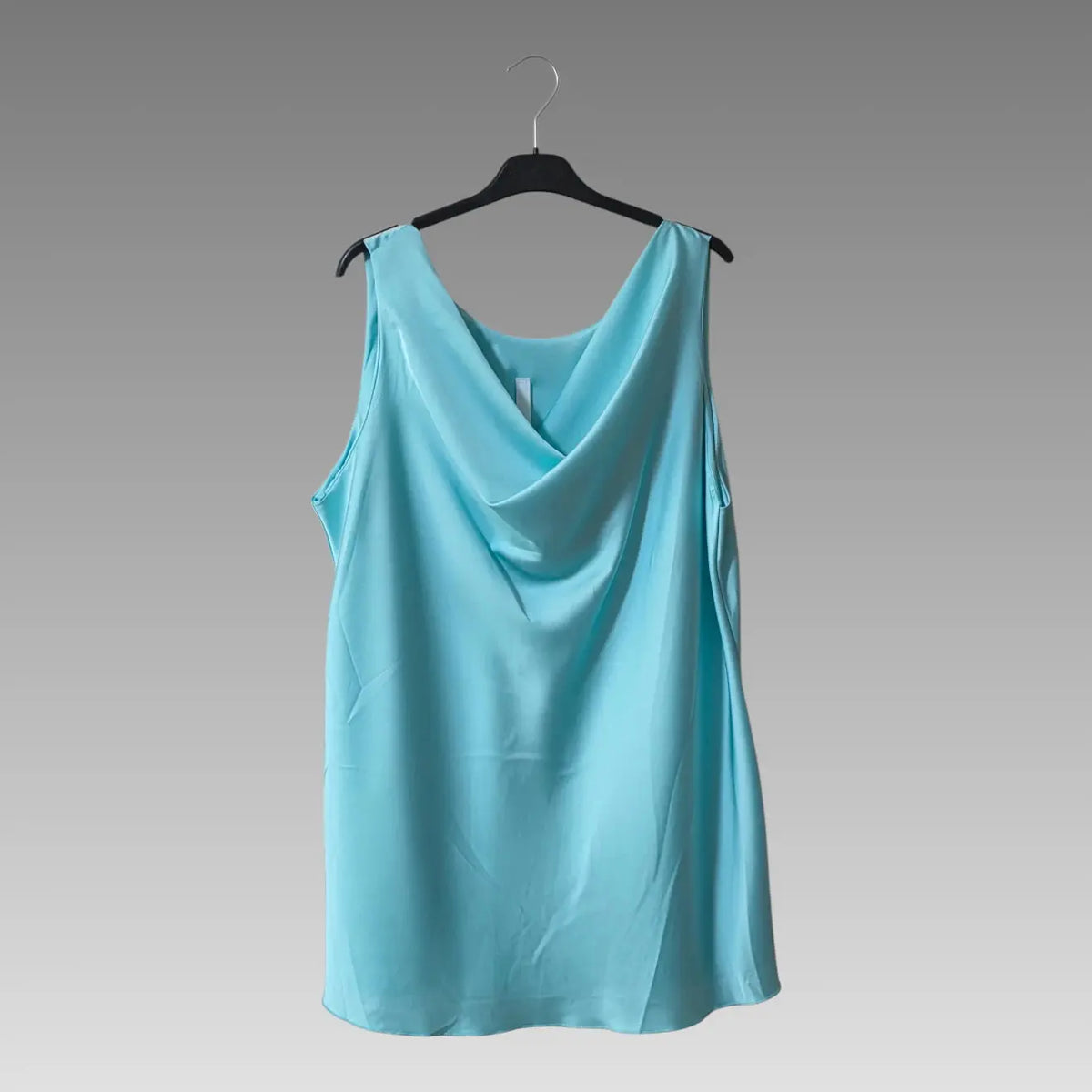 Top con escote drapeado